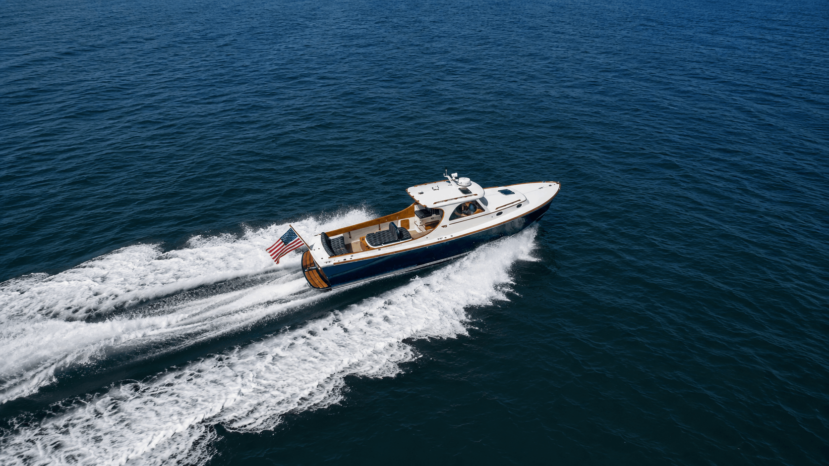 Aerial view of a private motor yacht on the water off Costa Rica's Central Pacific coast