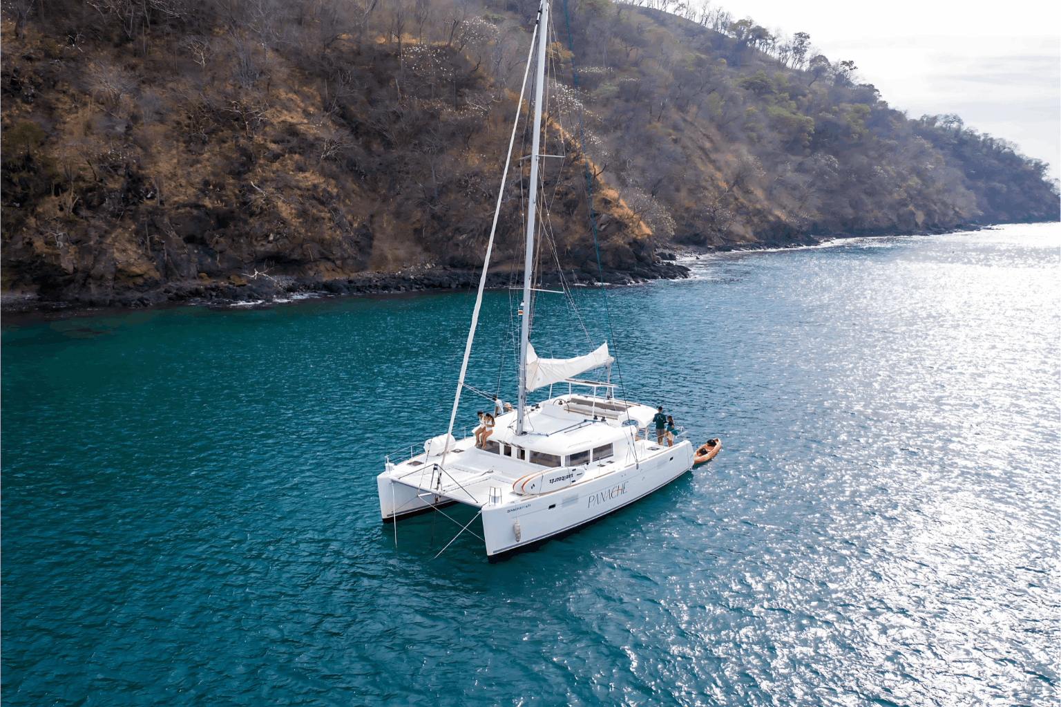 Sailing catamaran anchored in a calm bay near Playa Flamingo, Costa Rica