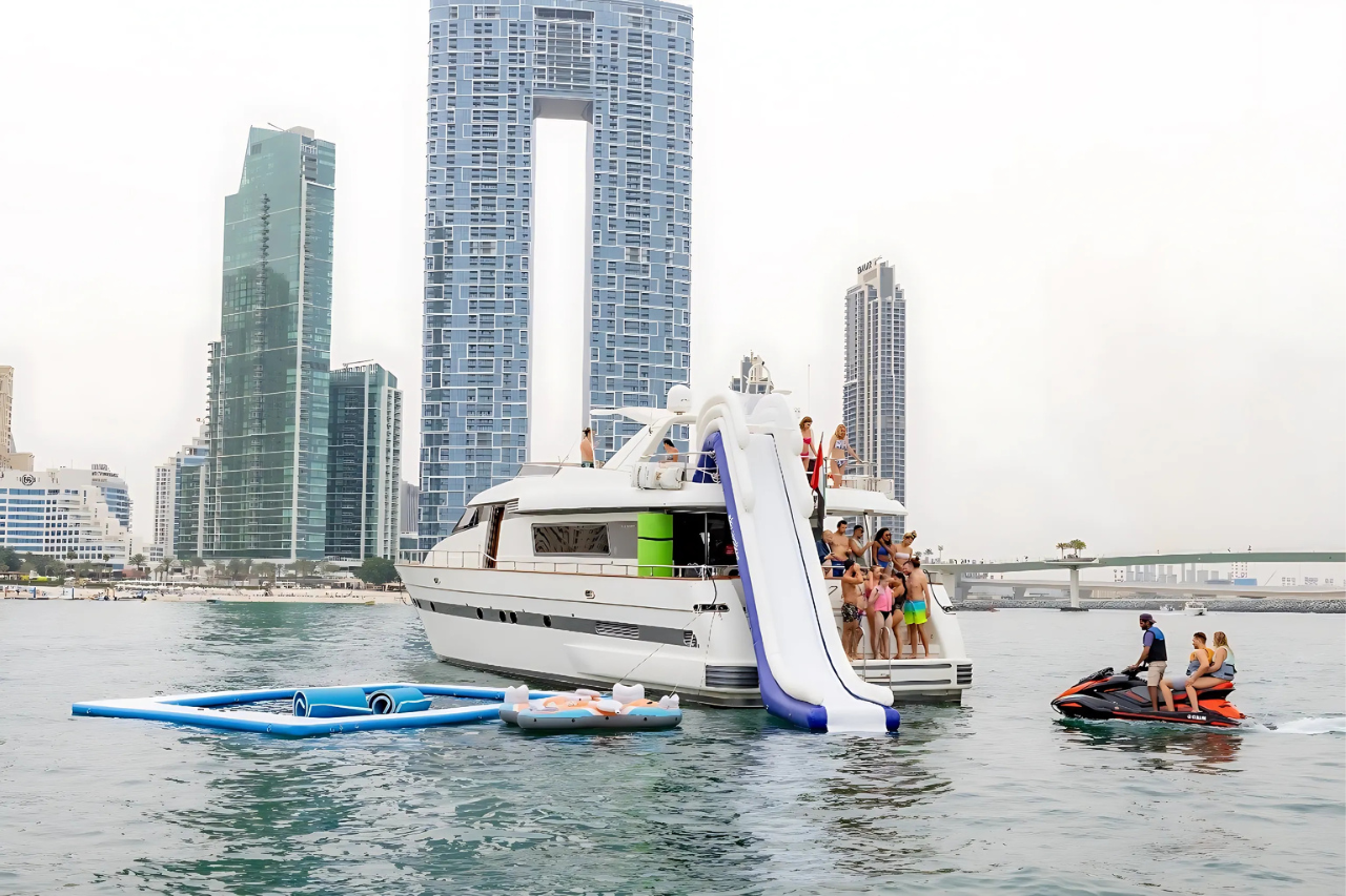 Dubai Ride & Slide Shared Yacht Cruise – 3h Watersports & BBQ
