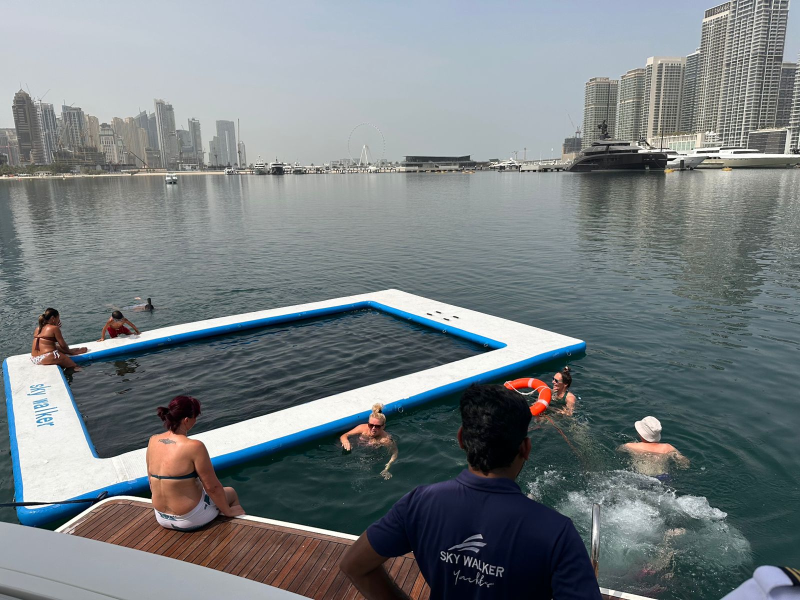 Dubai Ride & Slide Shared Yacht Cruise – 3h Watersports & BBQ