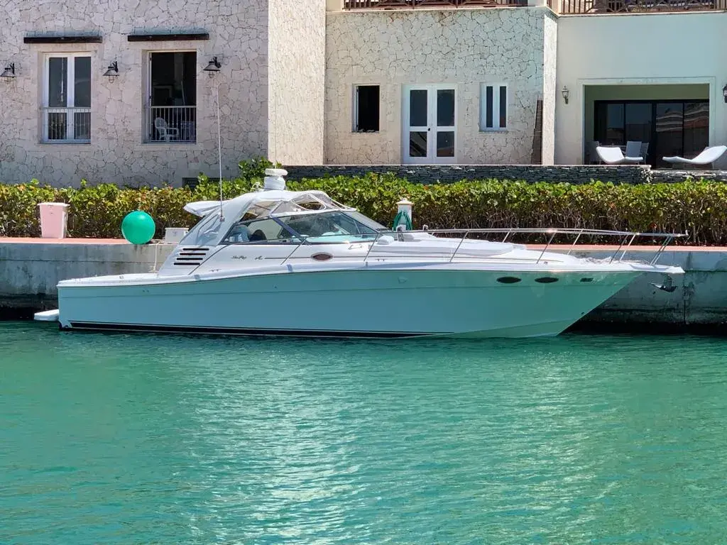 Cap Cana Weather December with a private yacht docked at a luxury marina, highlighting ideal boating conditions and calm Caribbean waters.