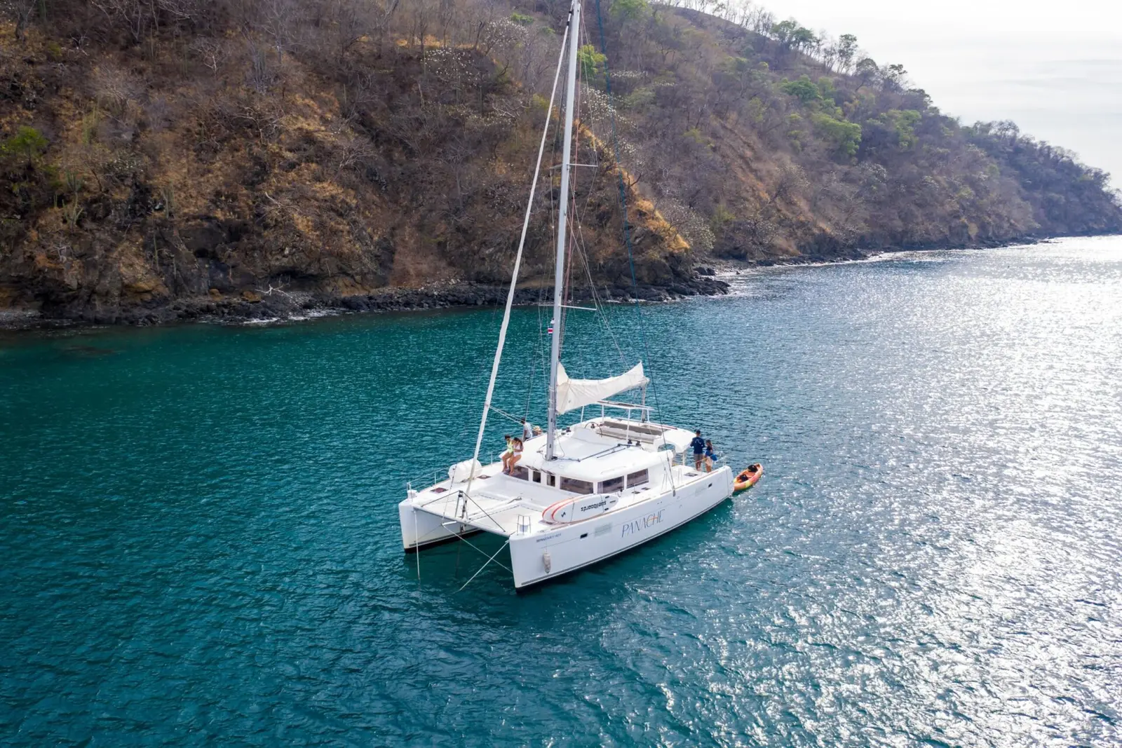 Sailing catamaran anchored in a calm bay near Playa Flamingo, Costa Rica