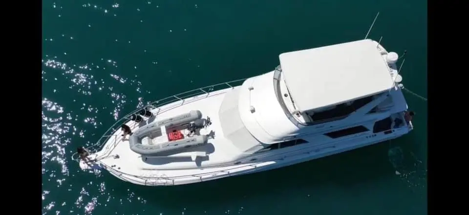 Aerial view of a private motor yacht on the water off Costa Rica's Central Pacific coast